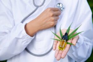 A,Doctor,Or,Researcher,Holds,A,Bottle,Of,Marijuana,Oil